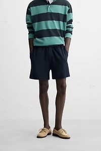 TEXTURED RELAXED FIT SHORTS