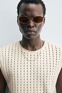 T-SHIRT AJOURÉ SANS MANCHES