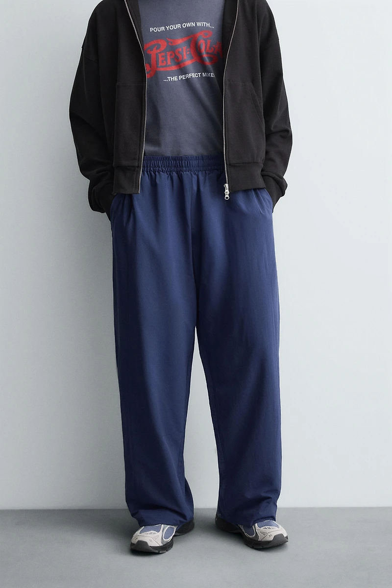 PANTALON TECHNIQUE À BANDES