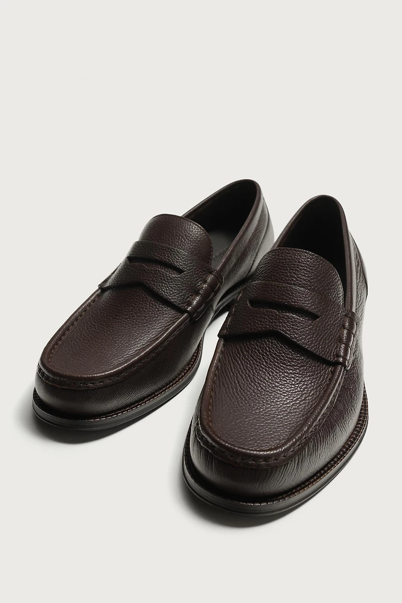 MOCASSINS EN CUIR À MASQUE