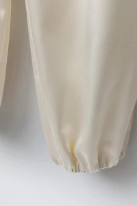 PANTALON BOUFFANT À FLEUR