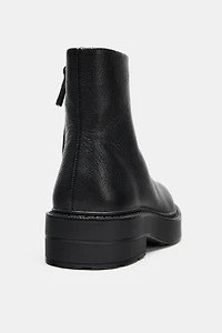 WATER REPELLENT FLAT LEATHER ANKLE BOOTS