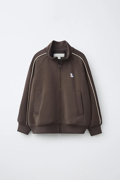 VESTE SPORT À LISERÉ EN CONTRASTE