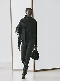 Trousers with elastic hems