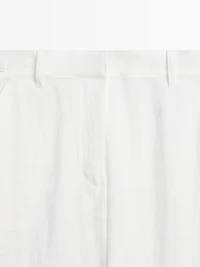 Flowing trousers with buckles