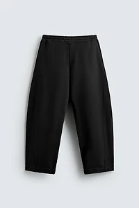 BALLOON PANTS WITH TWISTED SEAMS