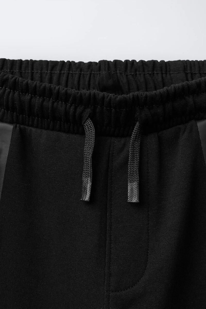 SPORTY INTERLOCK JOGGERS