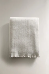 PLAID DOUX À FRANGES