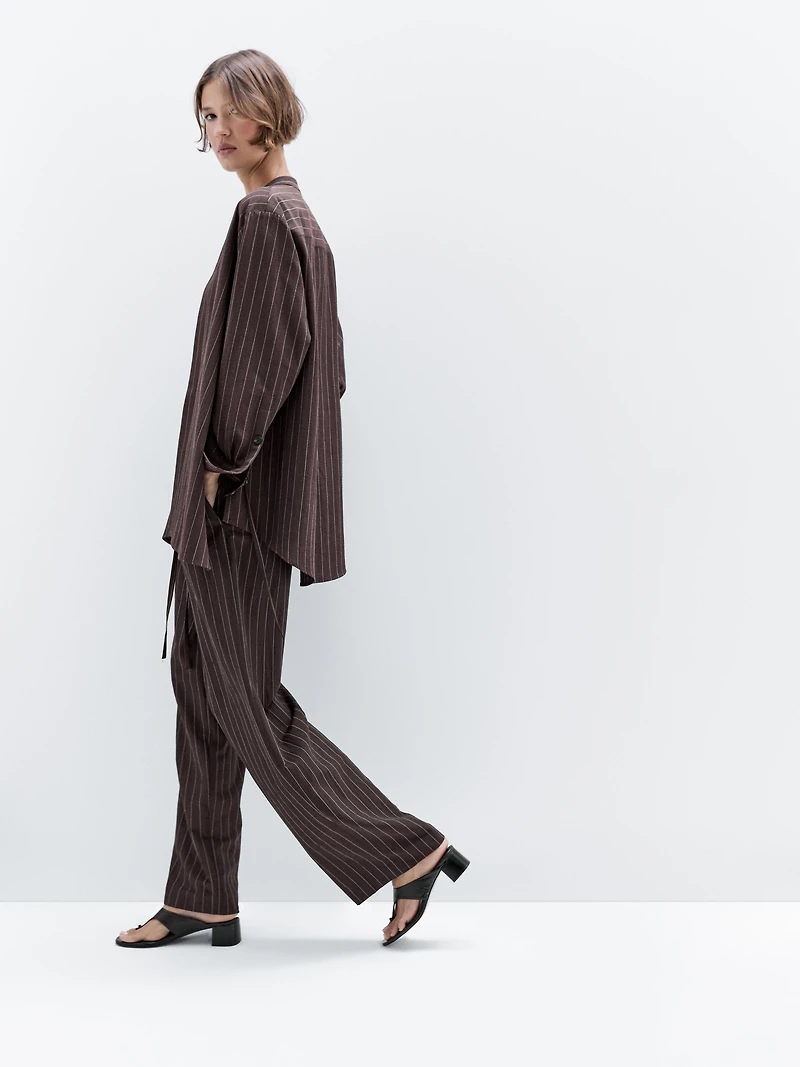 Darted pinstripe trousers