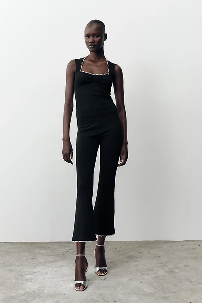 STRETCH TOP WITH METALLIC THREAD