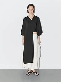 Cape-style blouse with asymmetric cut - STUDIO