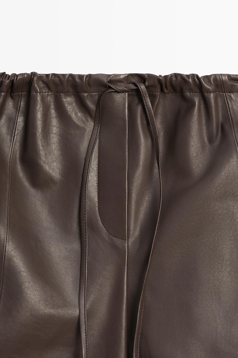 Long nappa leather Bermuda shorts