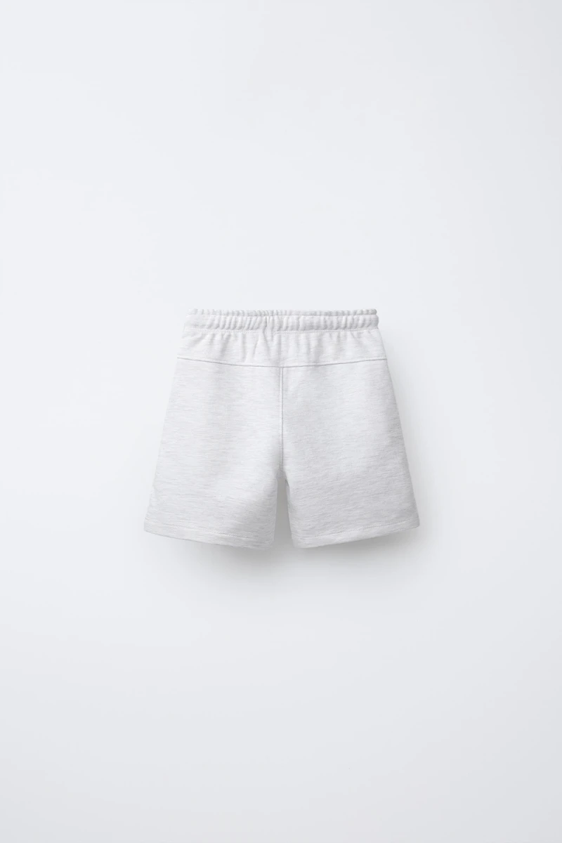 STRAIGHT FIT EMBOSSED TEXT TERRY SHORTS