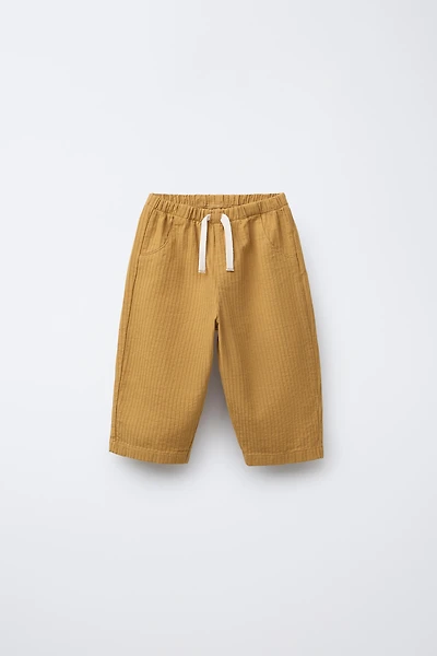 TEXTURED BAGGY PANTS