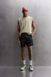 LIGHTWEIGHT PERFORATED SHORTS