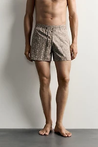 PAISLEY PRINT MID-LENGTH SWIM TRUNKS