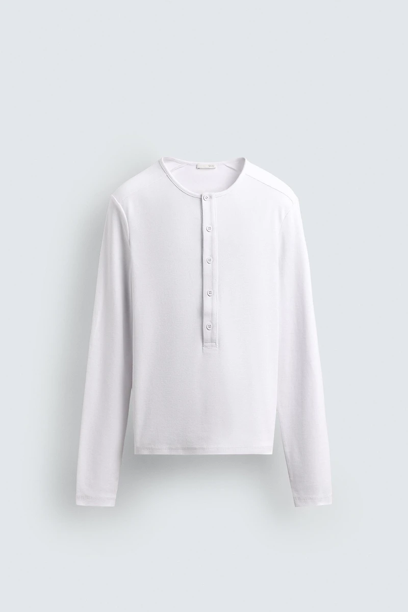 RIBBED SHIRT WITH BUTTON NECK