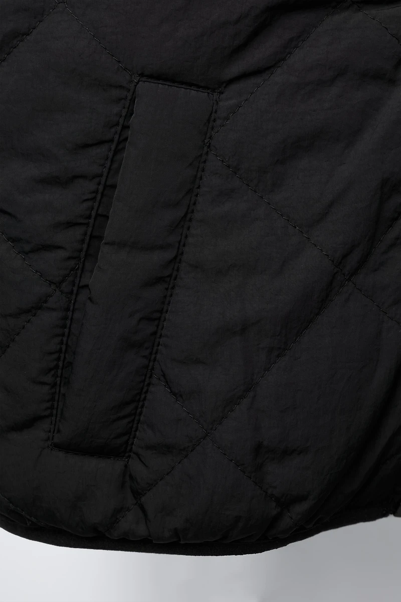 REVERSIBLE FLEECE VEST