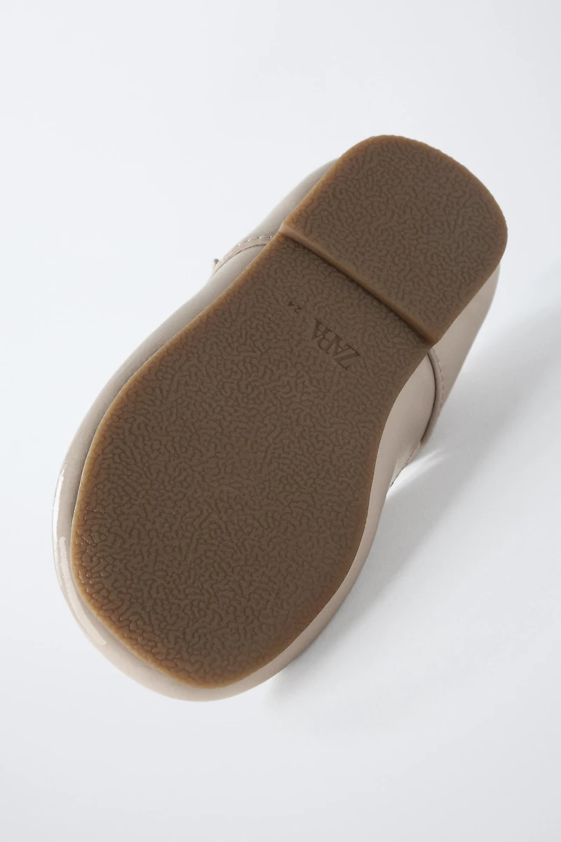 PATENT FINISH T-BAR BALLERINAS