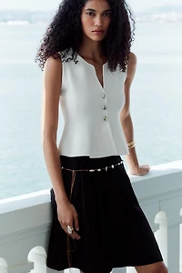PEPLUM KNIT TOP