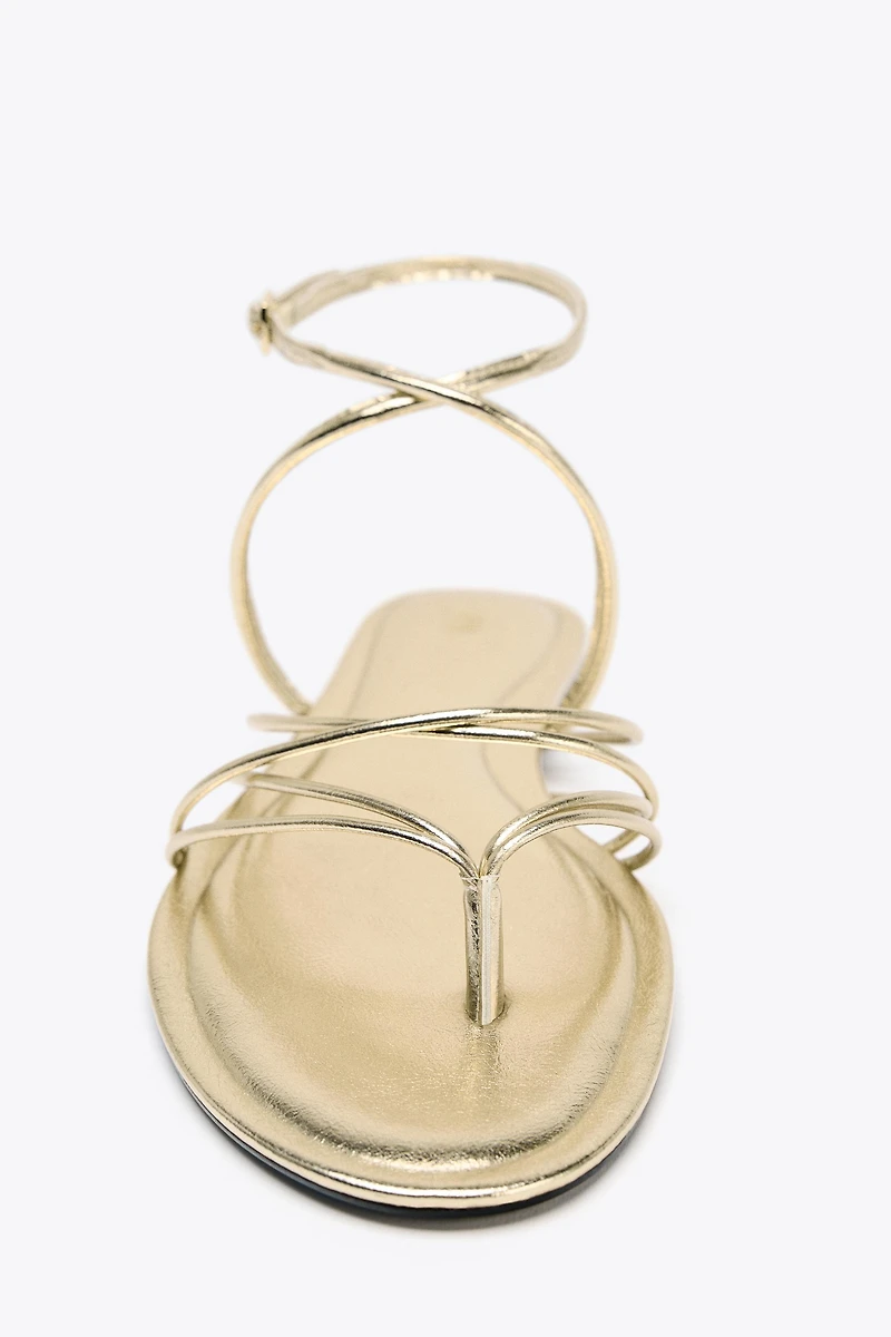 GOLD STRAPPY FLAT SANDALS