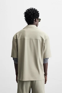 TECHNICAL ZIP POLO SHIRT