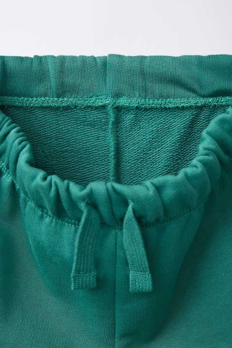 TEXT PLUSH SHORTS