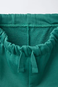TEXT PLUSH SHORTS