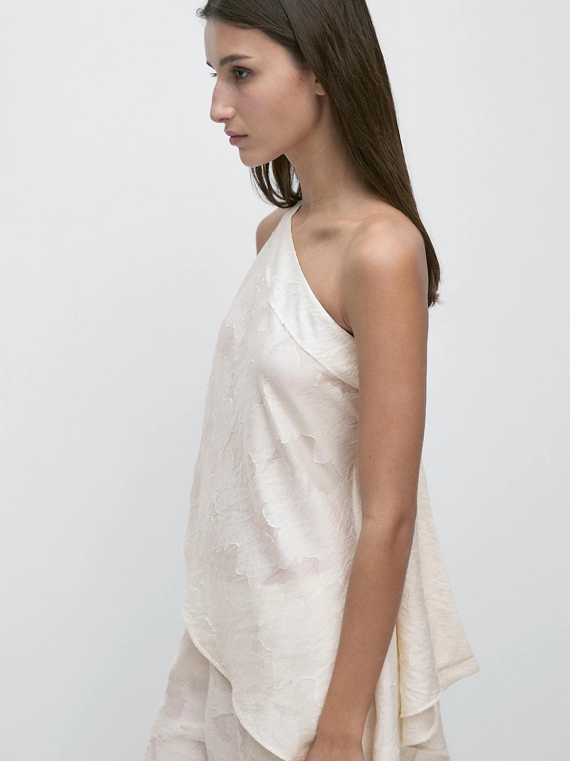 Top with asymmetric neckline