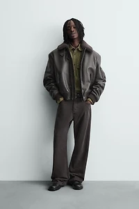 BLOUSON EN MATIÈRE SYNTHÉTIQUE AVEC COL AMOVIBLE