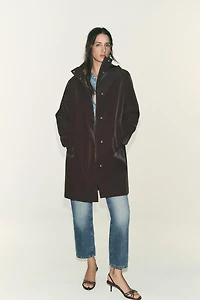 VESTE ENDUITE À CAPUCHE COUPE-VENT
