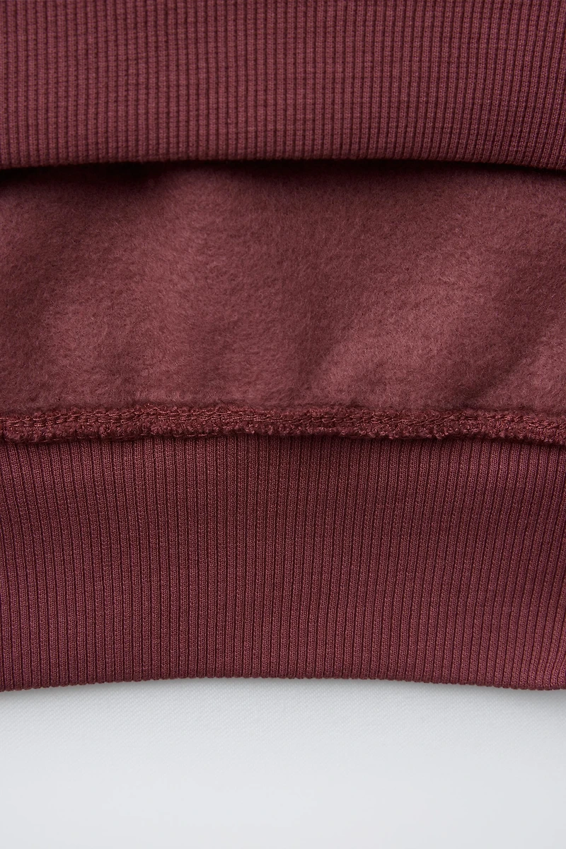 SWEAT À CAPUCHE INSCRIPTION BRODÉE