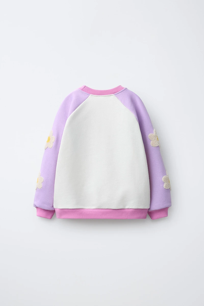 CONTRASTING SLEEVE FLORAL SWEATSHIRT