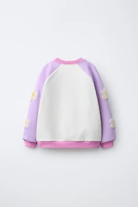 CONTRASTING SLEEVE FLORAL SWEATSHIRT