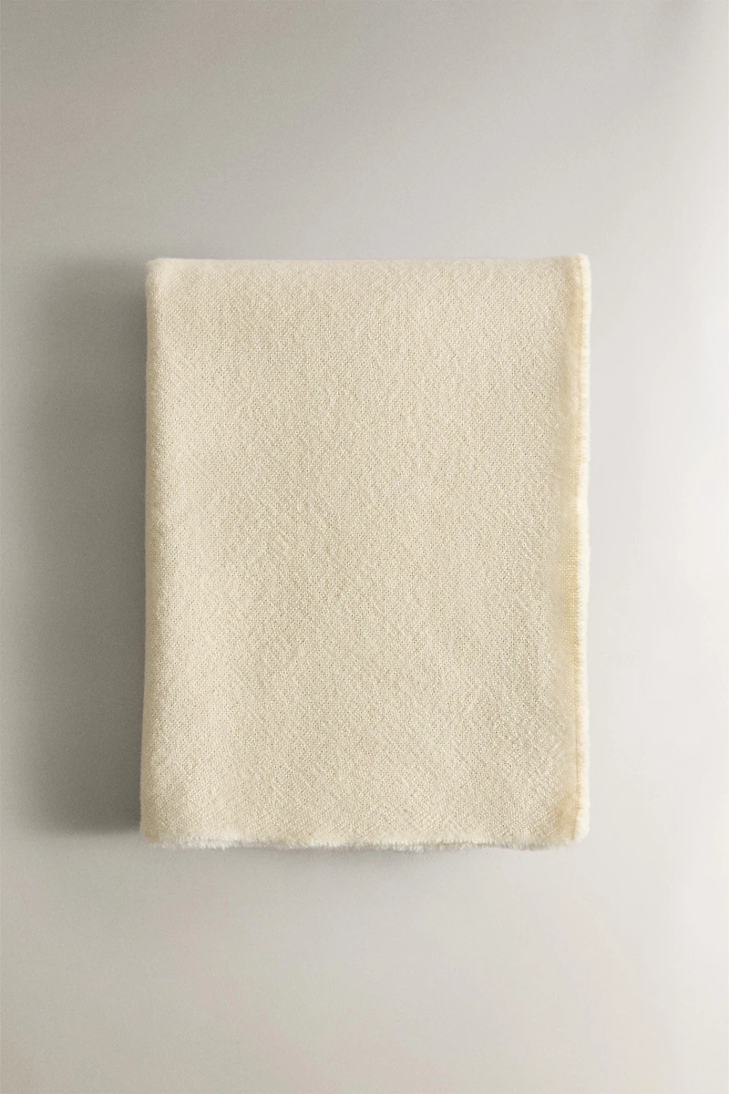 PLAID DOUX À FRANGES