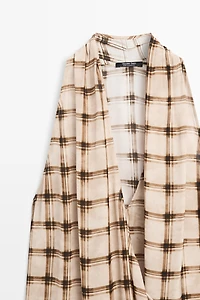 Flowing check print surplice top