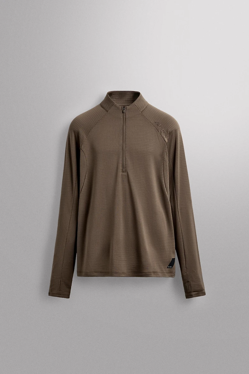 POLARTEC© QUARTER-ZIP SWEATSHIRT