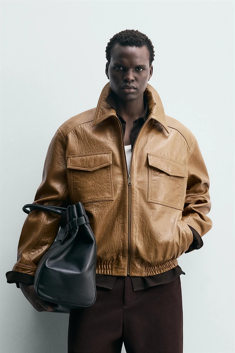 BLOUSON EN CUIR À POCHES