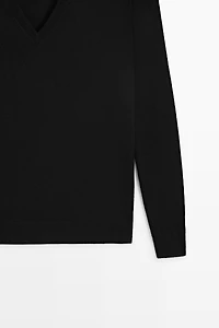 V-neck knit sweater