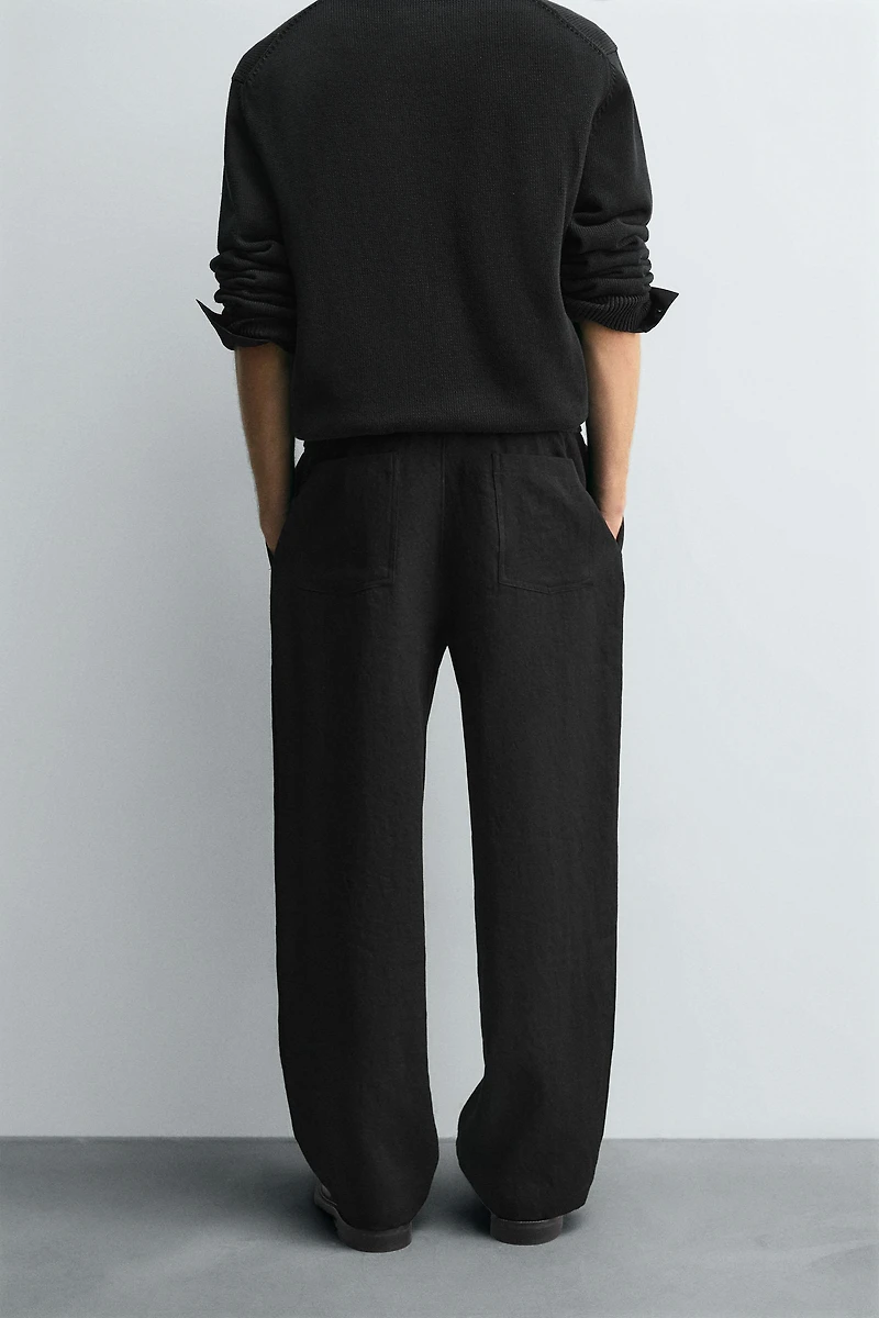FLOWY PLEATED PANTS
