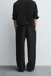 FLOWY PLEATED PANTS
