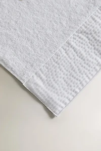 BATH TOWEL WITH BAND APPLIQUÉ