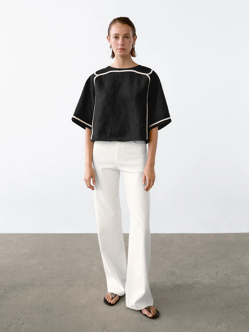 Blouse avec broderie contrastante