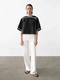 Blouse avec broderie contrastante