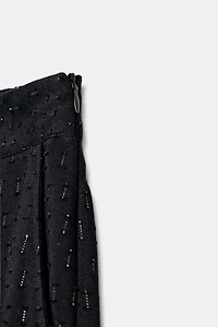 METALLIC THREAD BALLOON PANTS