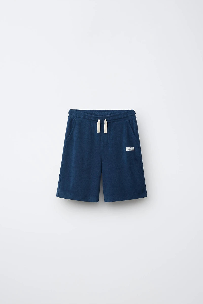 ENSEMBLE POLO ET BERMUDA EFFET ÉPONGE