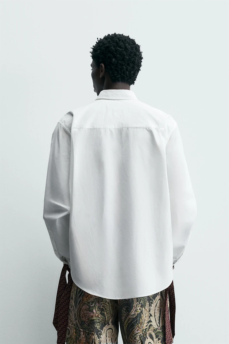 LIMITED EDITION SHIRT WITH BOWS AND BIB FRONT