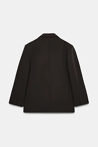 VESTE OVERSIZE À BOUTONNAGE CROIS