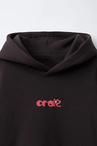 SWEAT À CAPUCHE IMPRIMÉ