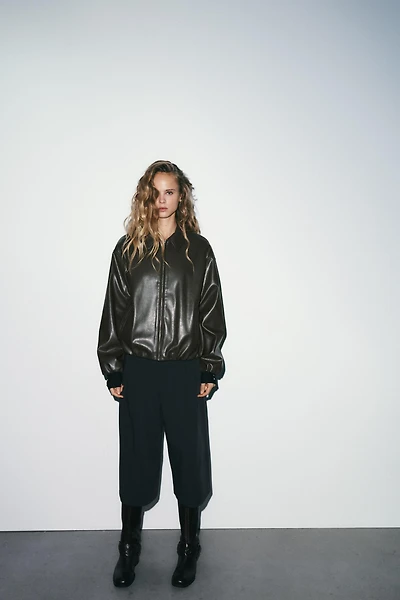 FAUX LEATHER JACKET WITH ELASTICATED DETAILS